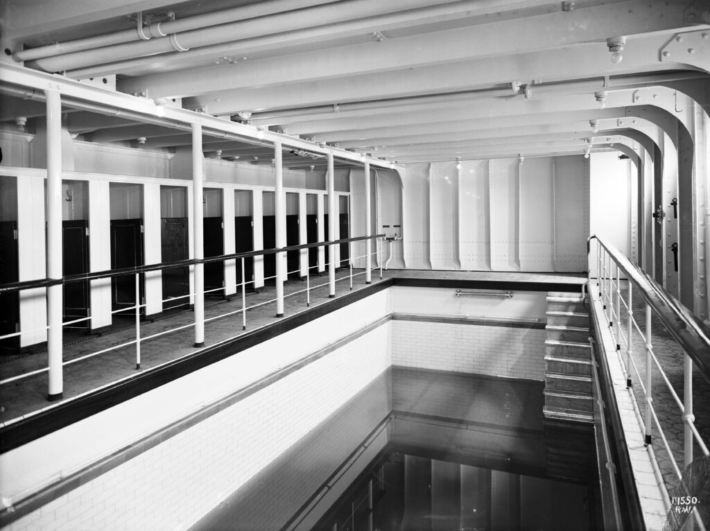 Octagonal tiles are discernable here lining the deck around Olympic’s swimming pool